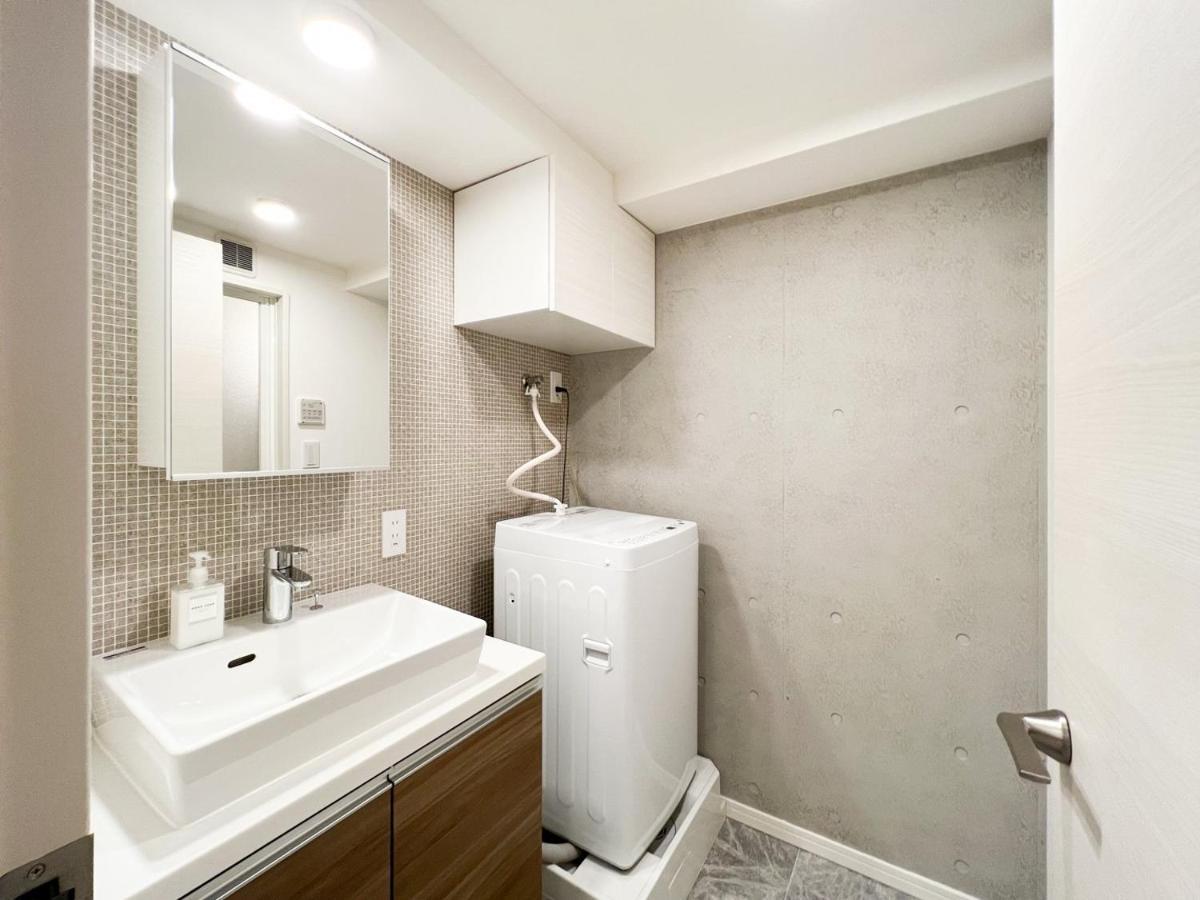 Appartamento Wellsquareism Honancho Tokyo Esterno foto